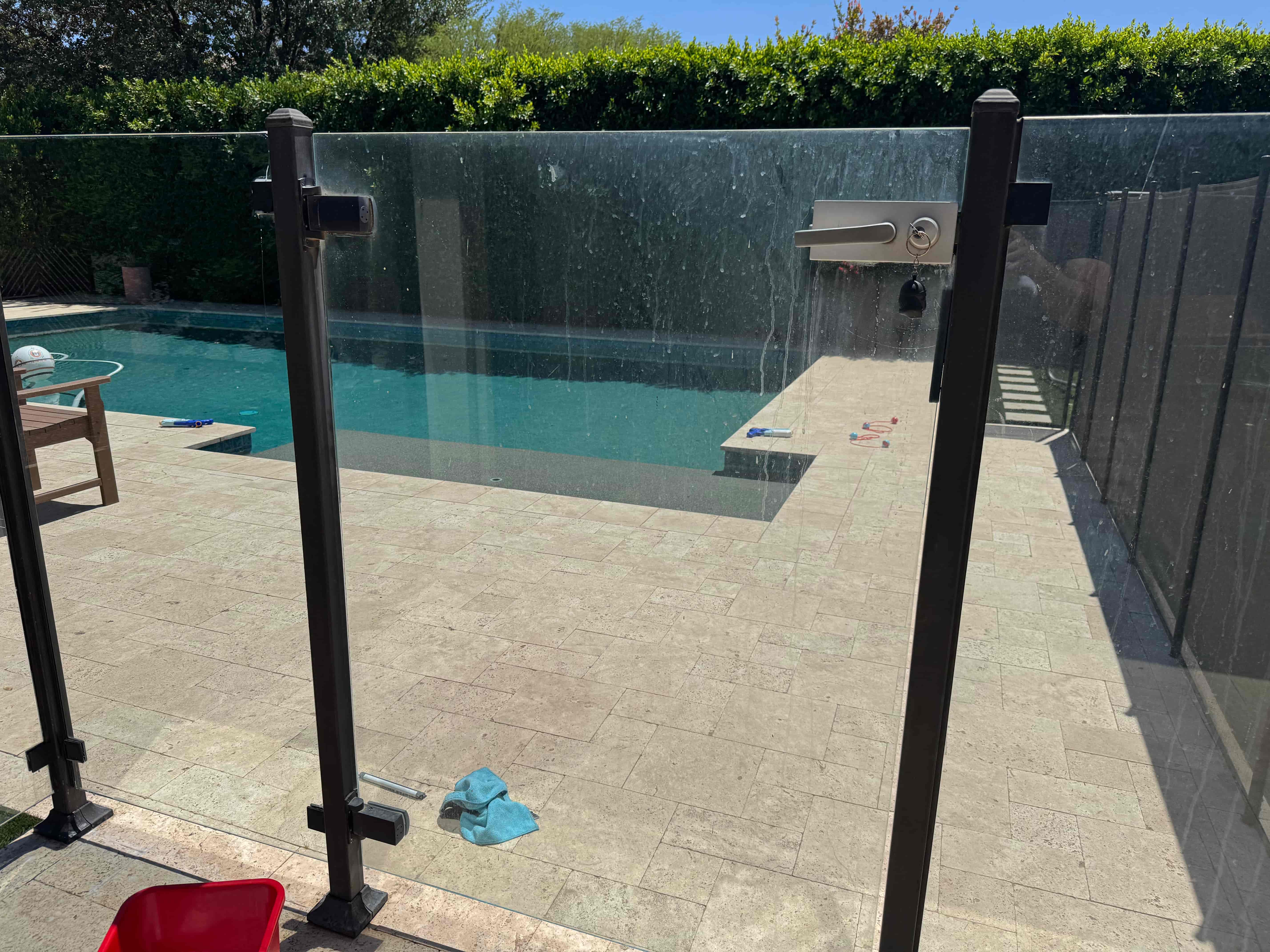 Pool gate glass hard water removal Surprise AZ