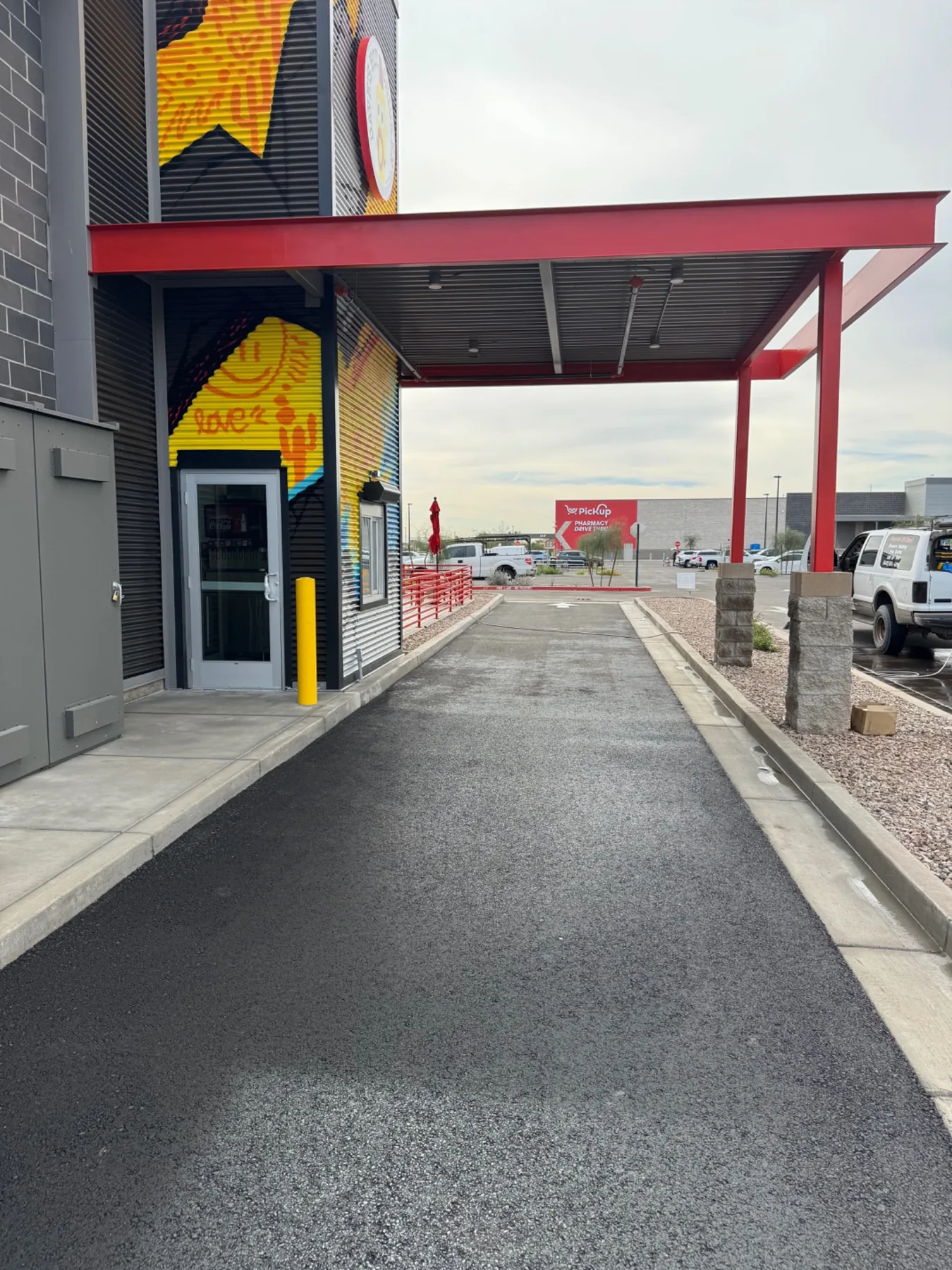 restaurant drive-thru lane after post-construction cleanup