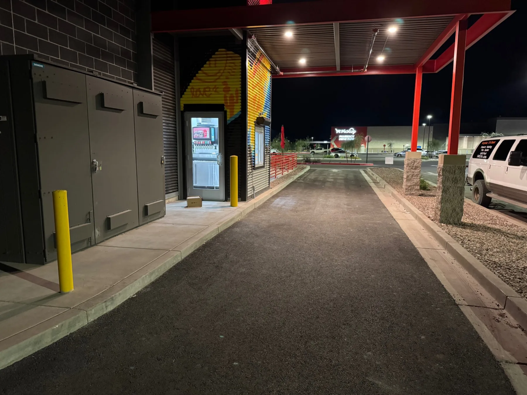 restaurant drive-thru lane before post-construction cleanup