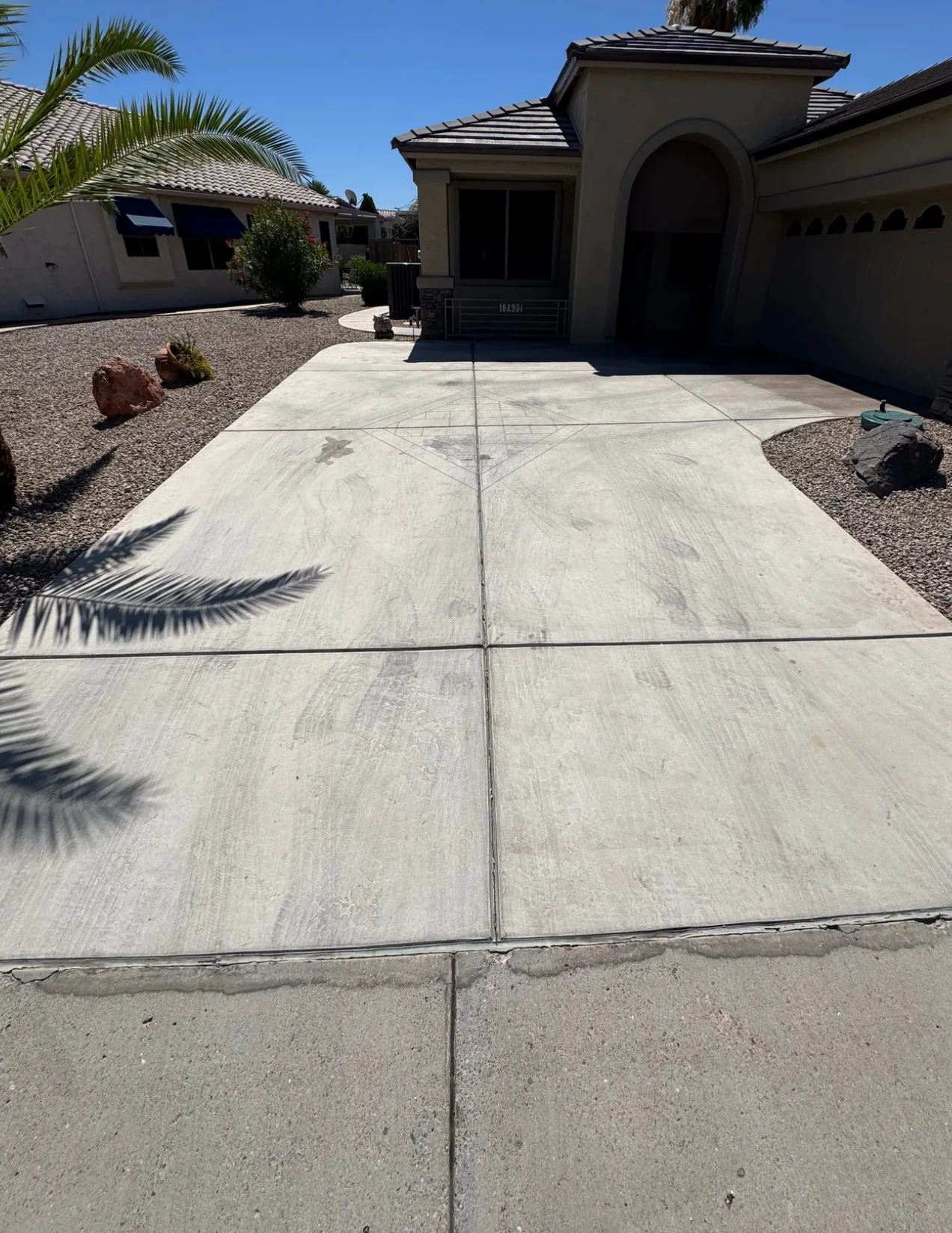 Residential concrete driveway before cleaning
